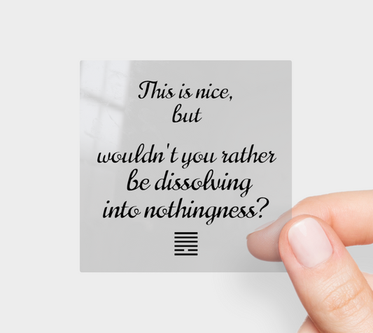 Hand holding a card with text 'This is nice, but wouldn't you rather be dissolving into nothingness?' on a light gray background.